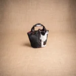 CARTERA AMANECER DE PELO