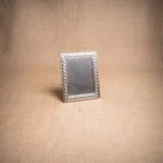 PORTARETRATO DE ALPACA LABRADA 15X21CM