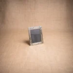 PORTARETRATO DE ALPACA LABRADA 13X18CM