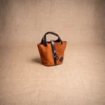 CARTERA AMANECER DE CARPINCHO