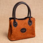 CARTERA RAÍZ DE CARPINCHO