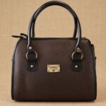 CARTERA BAÚL EN CUERO