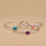 PULSERA SEMI ESCLAVA FINA CON PIEDRA CENTRAL